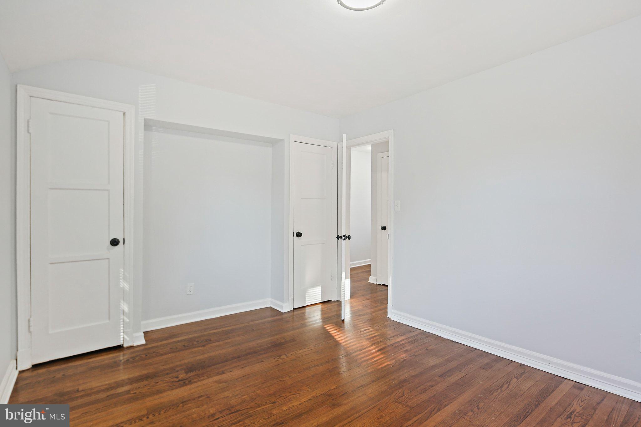 2603 Arcola Avenue Silver Spring, MD 20902 - Photo 20 of 34 a view of an empty room with wooden floor