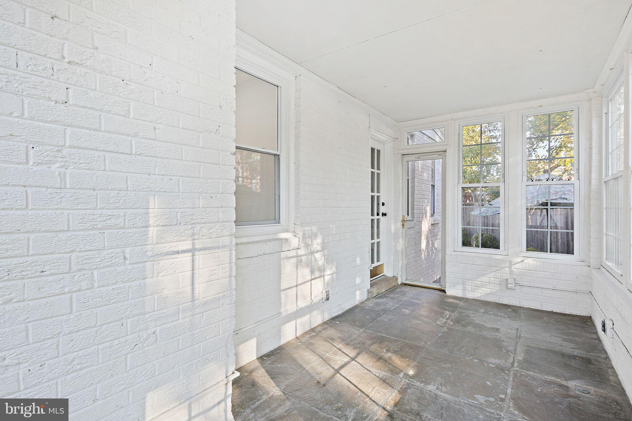 2603 Arcola Avenue Silver Spring, MD 20902 - Photo 27 of 34 a bathroom with a tub shower and window