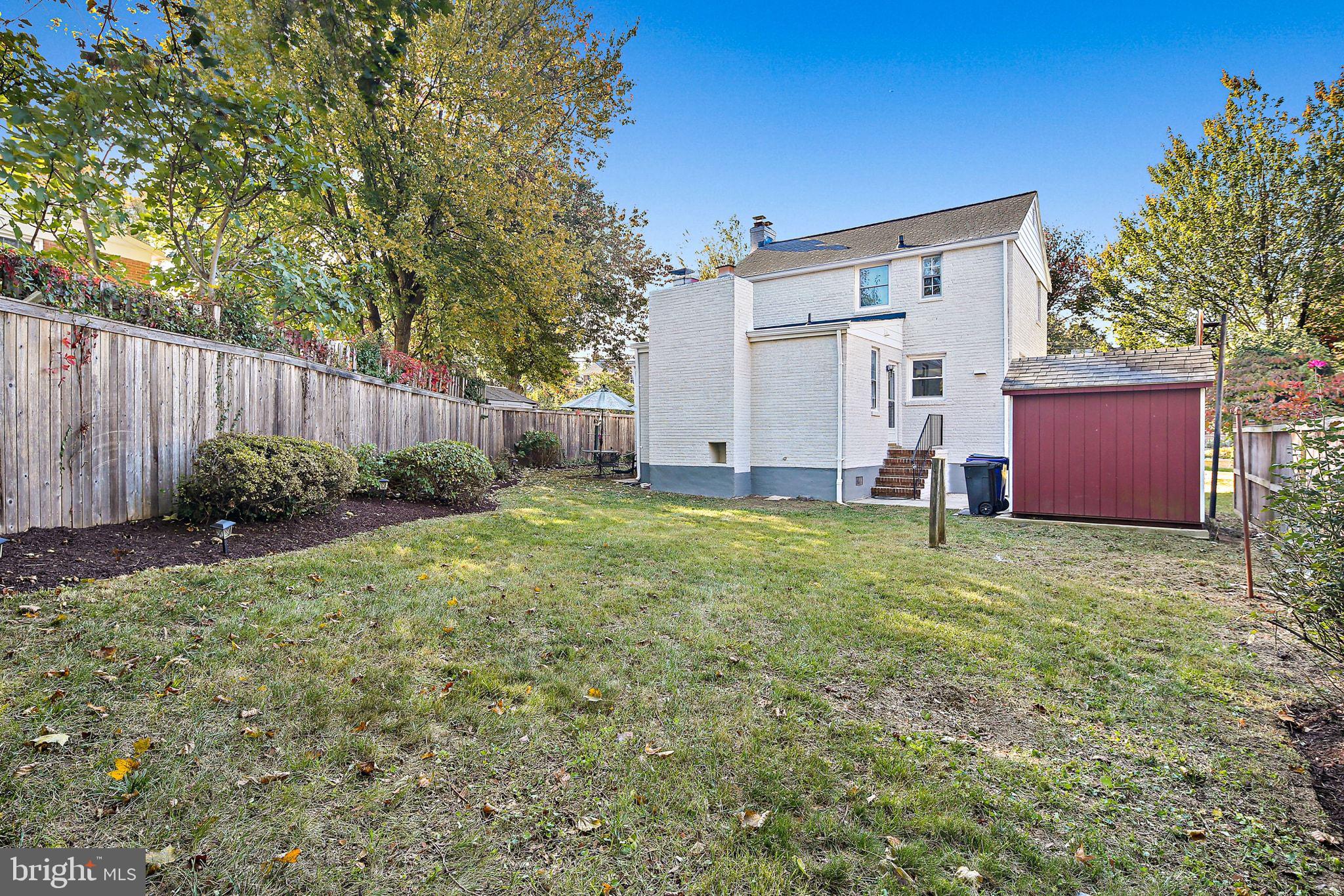 2603 Arcola Avenue Silver Spring, MD 20902 - Photo 31 of 34 a backyard of a house with lots of green space