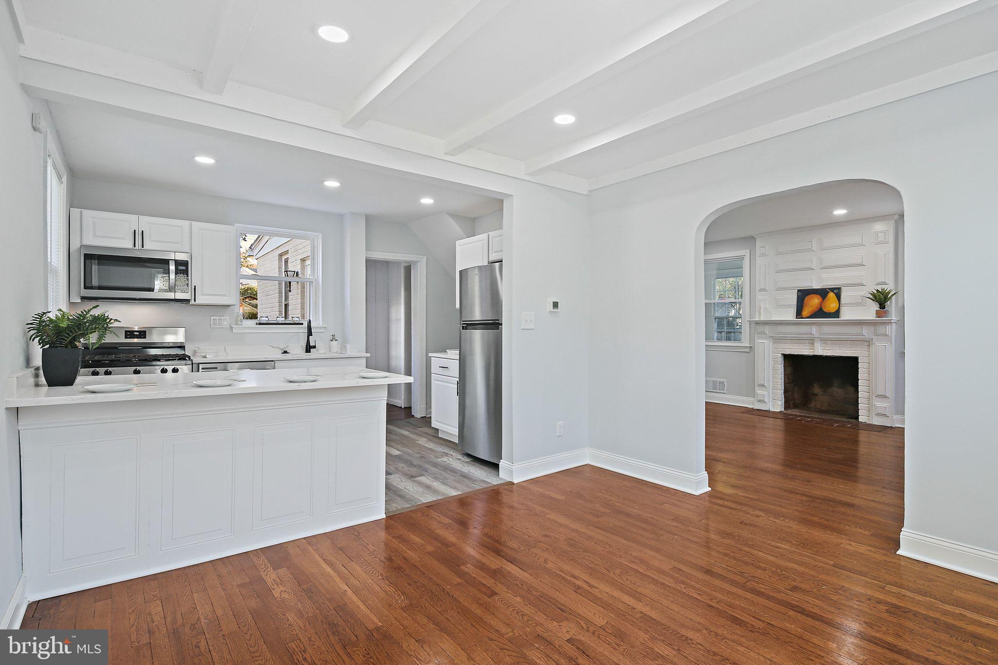 2603 Arcola Avenue Silver Spring, MD 20902 - Photo 8 of 34 a view of kitchen with sink microwave and stove