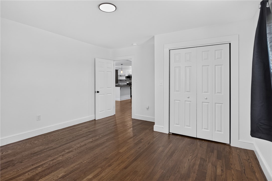 115 Pelfrey Street Seneca, SC 29672 - Photo 14 of 46 Rich hardwood flooring creates a welcoming ambiance in this versatile space, featuring ample closet storage.