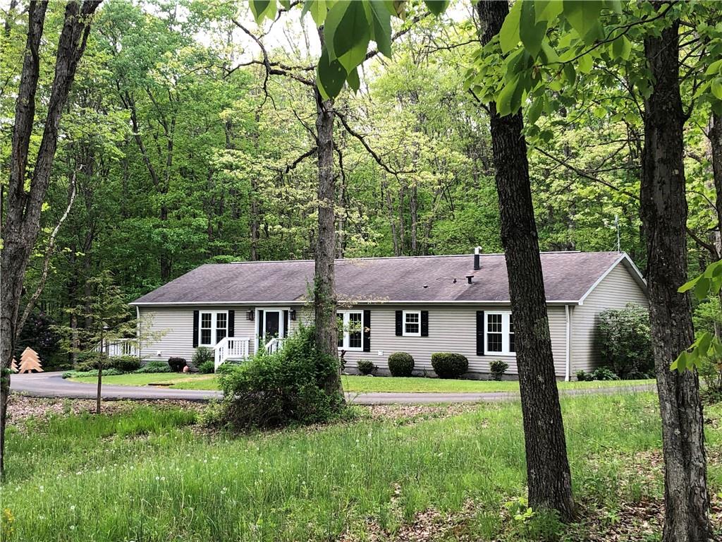 661 Nelson Road Farmington, PA 15437 - Photo 2 of 50 a front view of a house with a yard