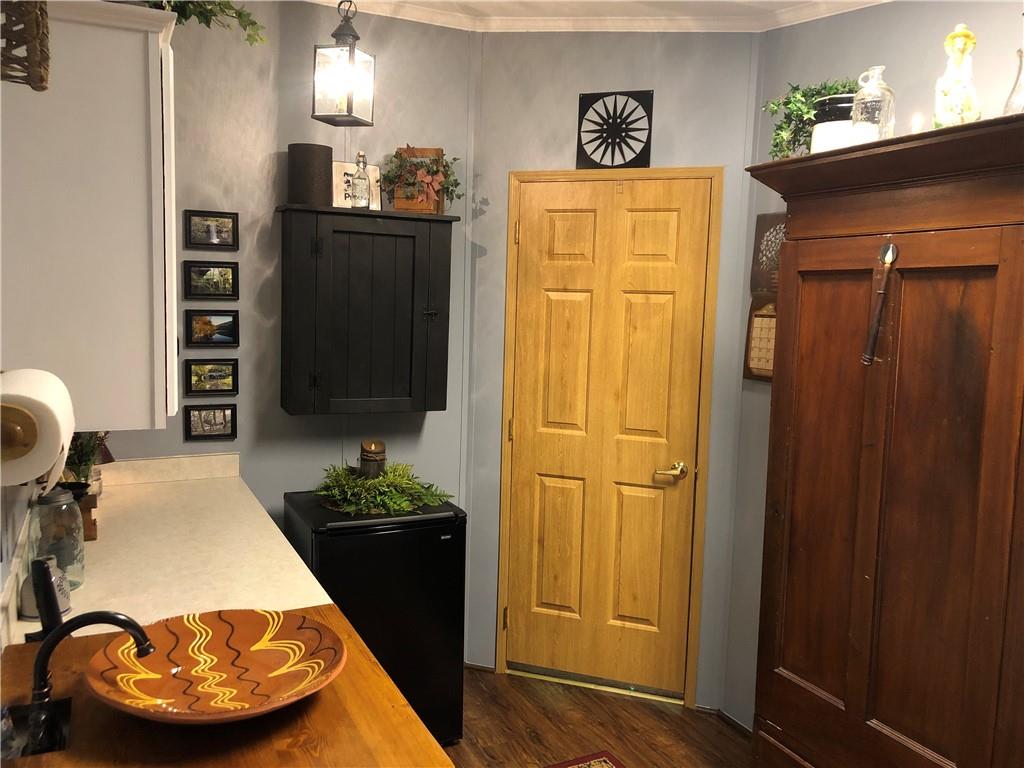 661 Nelson Road Farmington, PA 15437 - Photo 27 of 50 a bedroom with a bed and a closet