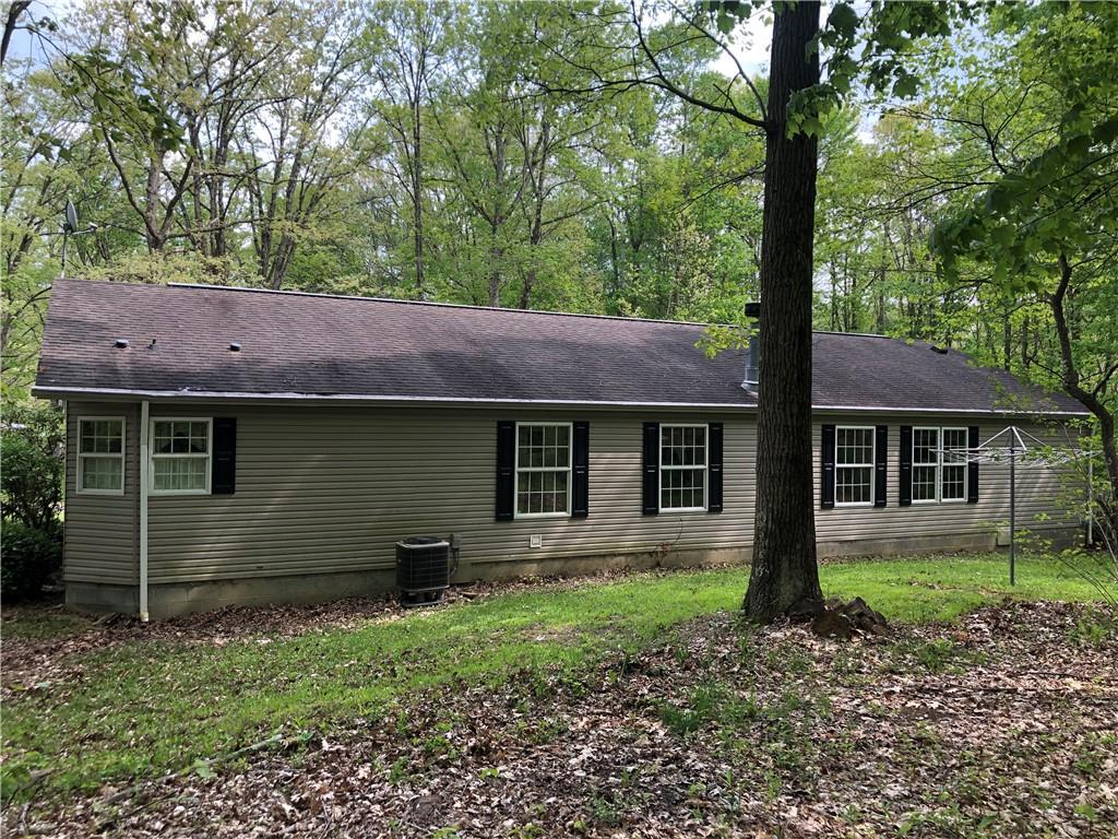 661 Nelson Road Farmington, PA 15437 - Photo 42 of 50 a view of a house with a garden