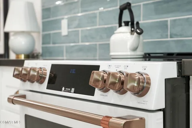 a close view of shoes and a potted plant on a counter