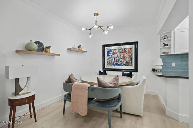 a living room with furniture a piano and a window