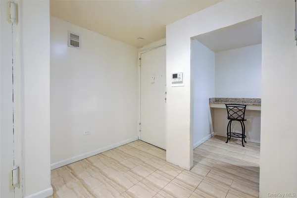 a view of a livingroom with furniture and wooden floor