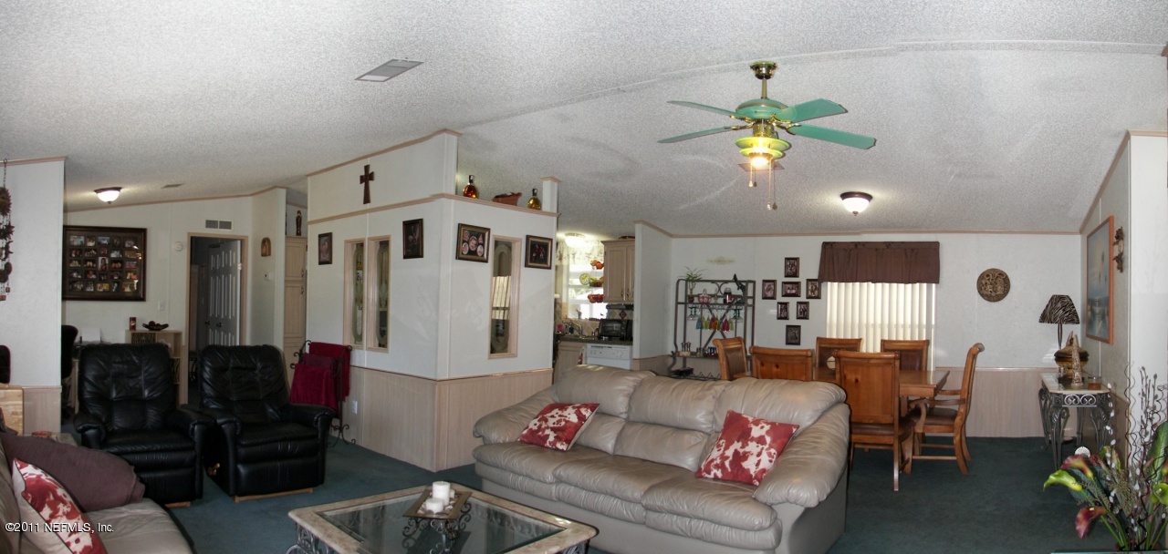 9361 Hipps Road Jacksonville, FL 32222 - Photo 16 of 21 a living room with furniture