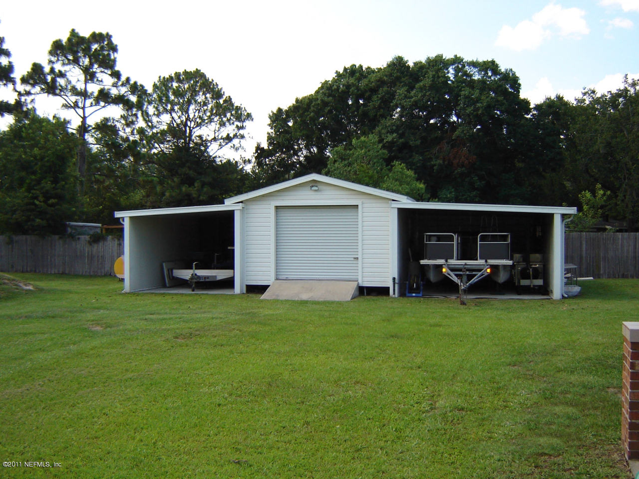 9361 Hipps Road Jacksonville, FL 32222 - Photo 6 of 21 a view of a house with backyard