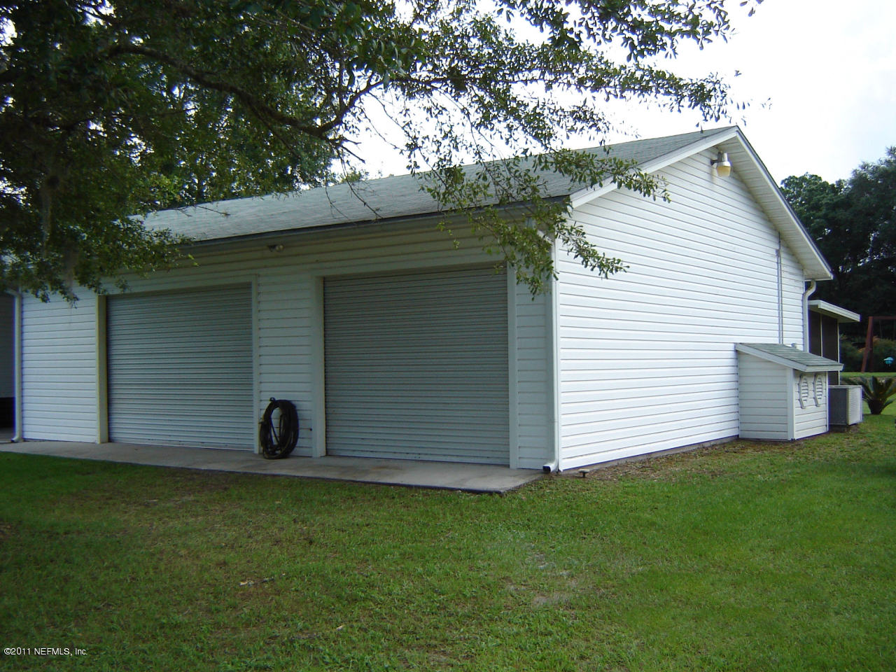 9361 Hipps Road Jacksonville, FL 32222 - Photo 7 of 21 a view of a back yard of the house