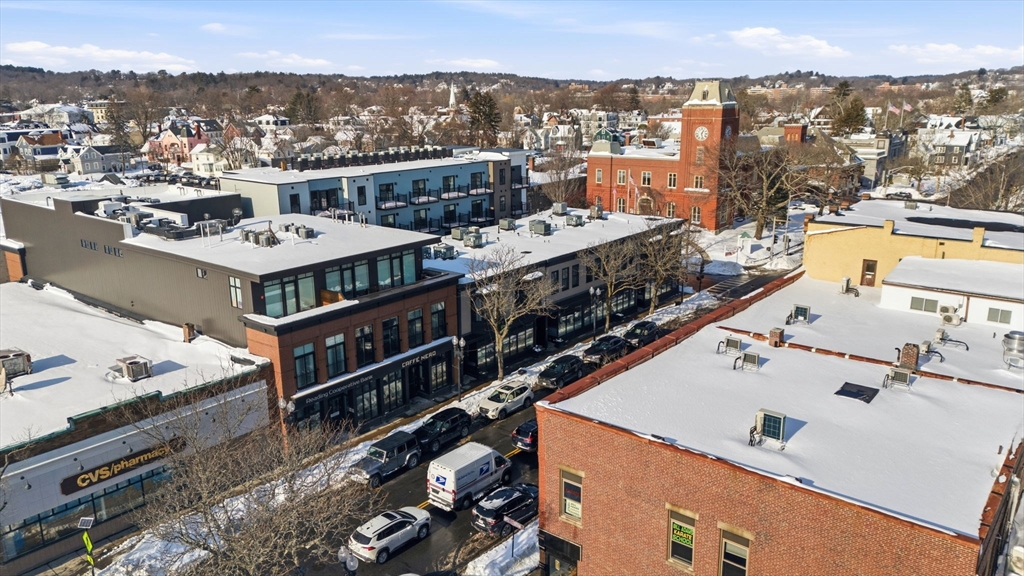 534 Main Street, Unit 11 Melrose, MA 02176 - Photo 14 of 16 a view of a city from a terrace