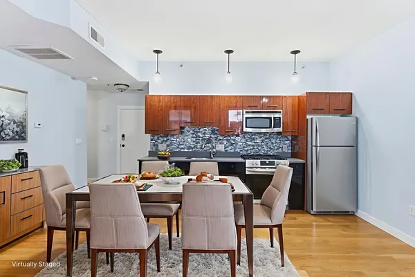 a view of a dining room with furniture