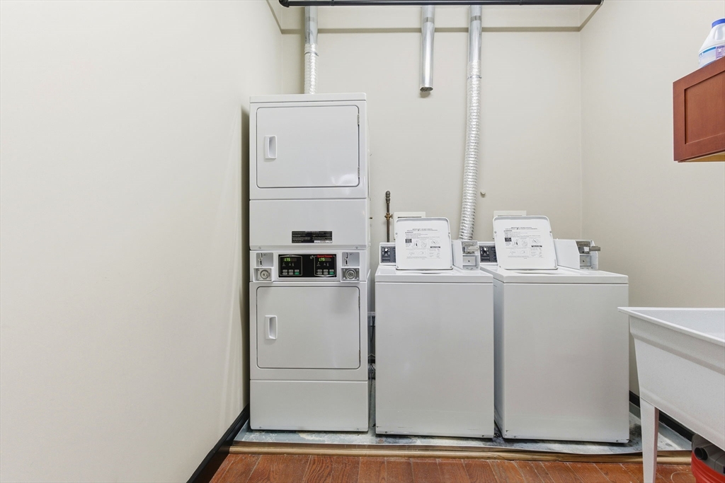 534 Main Street, Unit 11 Melrose, MA 02176 - Photo 8 of 16 a utility room with dryer and washer