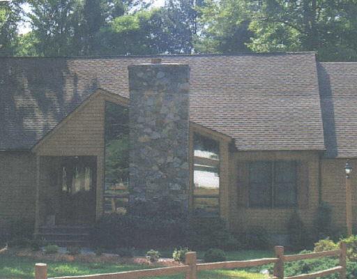 124 Munson Road Beacon Falls, CT 06403 - Photo 1 of 1 a brick house with a outdoor space
