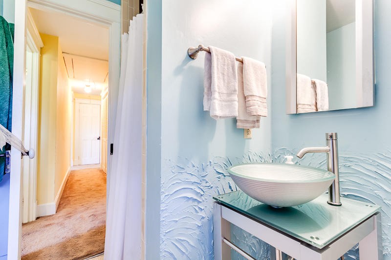 4307 McGinnis Road Corryton, TN 37721 - Photo 17 of 39 a bathroom with a sink and a mirror