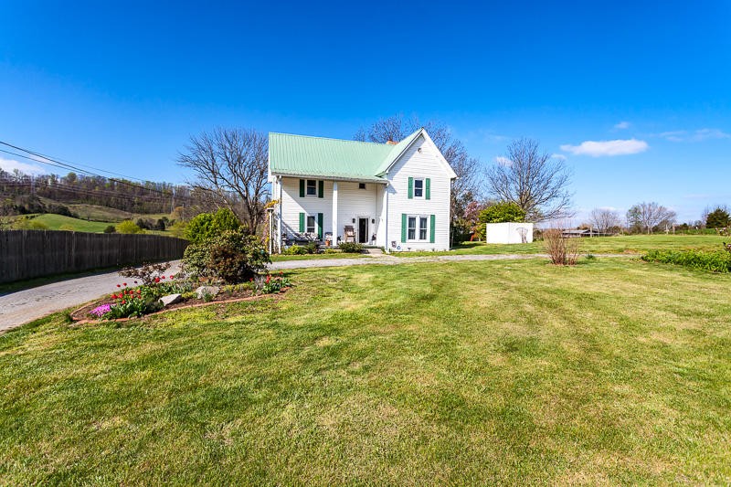 4307 McGinnis Road Corryton, TN 37721 - Photo 2 of 39 a front view of a house with a yard