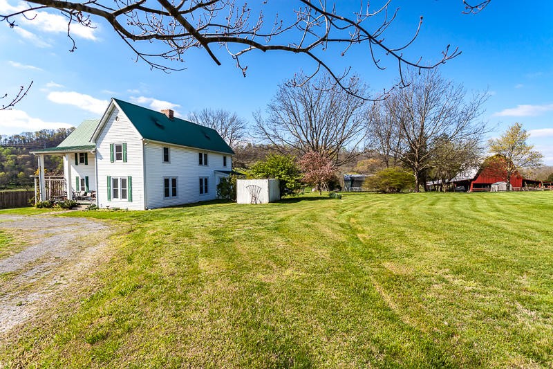 4307 McGinnis Road Corryton, TN 37721 - Photo 5 of 39 a front view of house with yard and trees