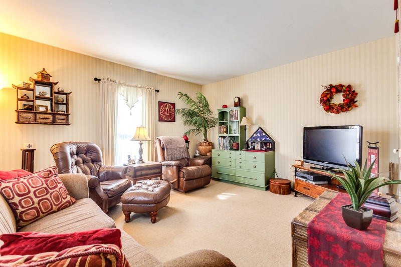 4307 McGinnis Road Corryton, TN 37721 - Photo 9 of 39 a bedroom with furniture and a flat screen tv