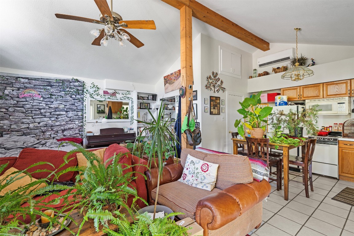 2606 Westover Road Austin, TX 78703 - Photo 23 of 38 a living room with patio furniture and a potted plant