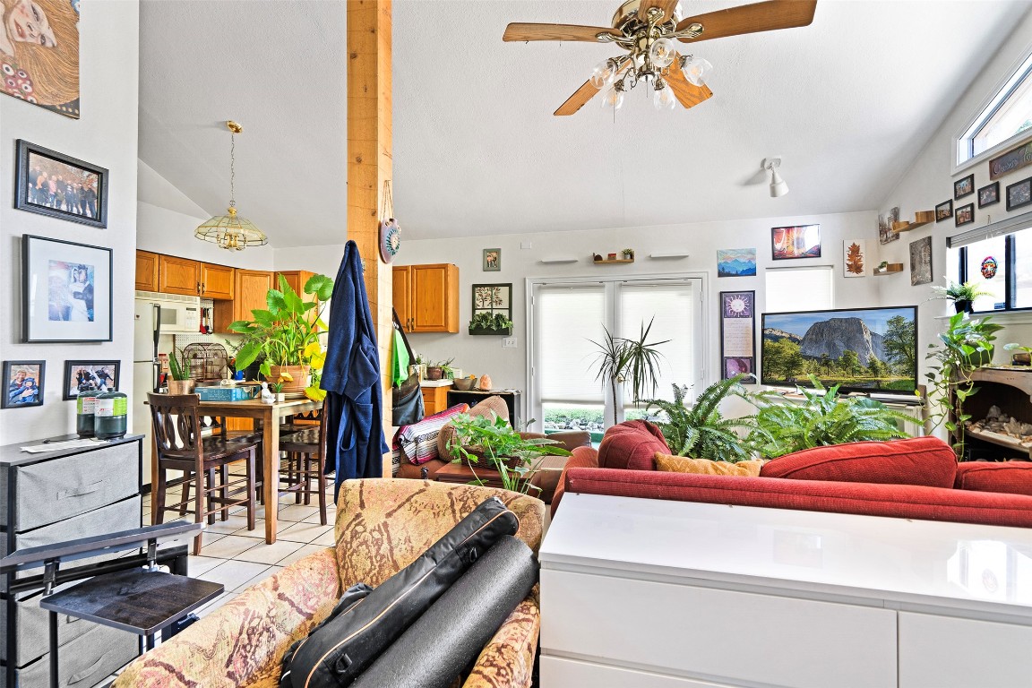 2606 Westover Road Austin, TX 78703 - Photo 24 of 38 a living room with patio furniture and a flat screen tv