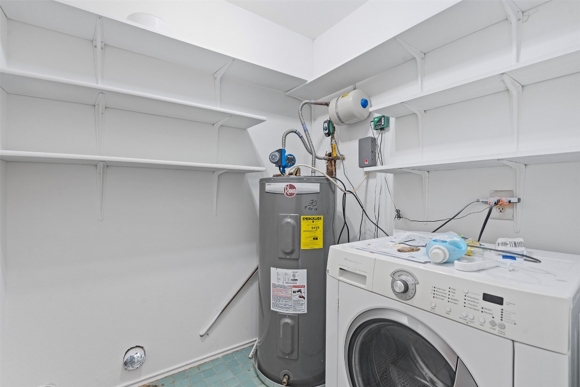 2606 Westover Road Austin, TX 78703 - Photo 32 of 38 a utility room with dryer and washer