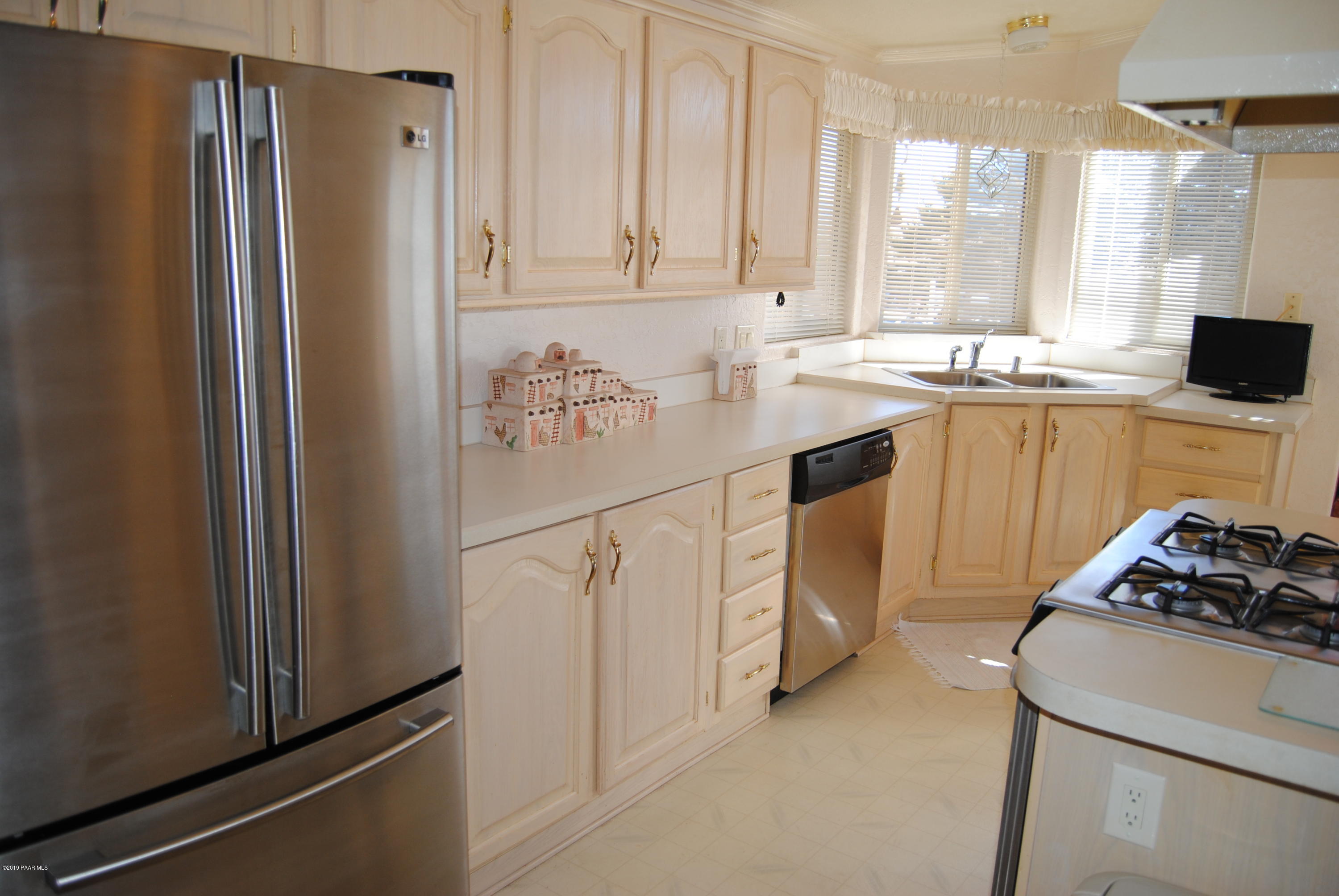 10378 Brahma Road Dewey, AZ 86327 - Photo 26 of 52 026_Fridge & Cabinets