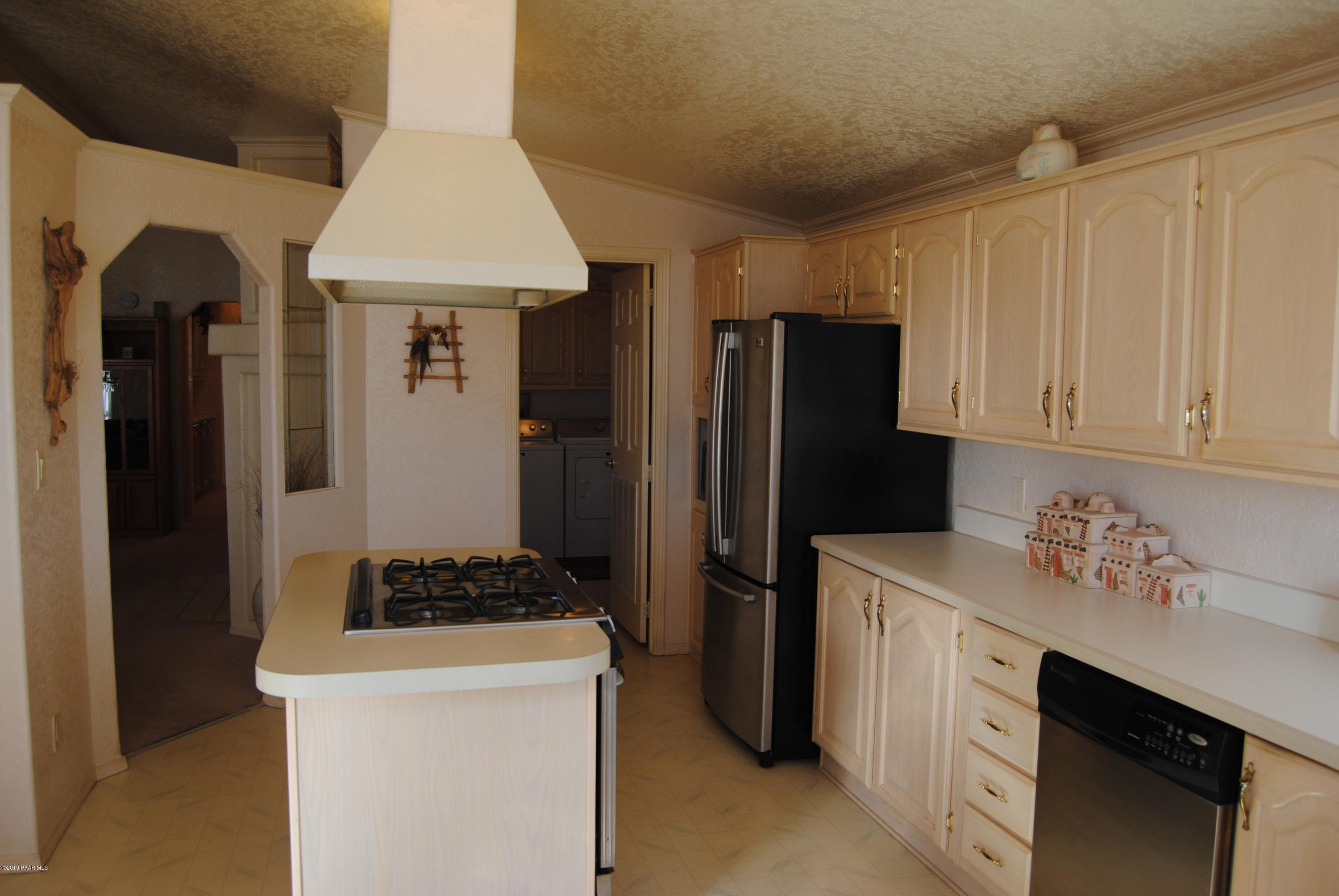 10378 Brahma Road Dewey, AZ 86327 - Photo 28 of 52 028_KitchenTo LaundryRm