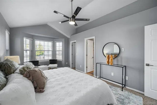 a bed room with a bed and dresser