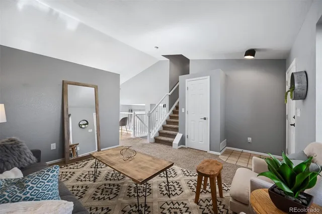 a workspace with furniture and window