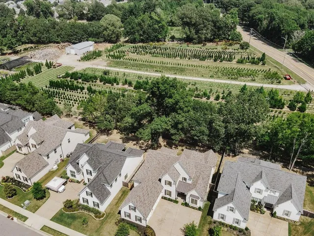an aerial view of residential house with outdoor space