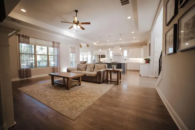 a living room with furniture and a table