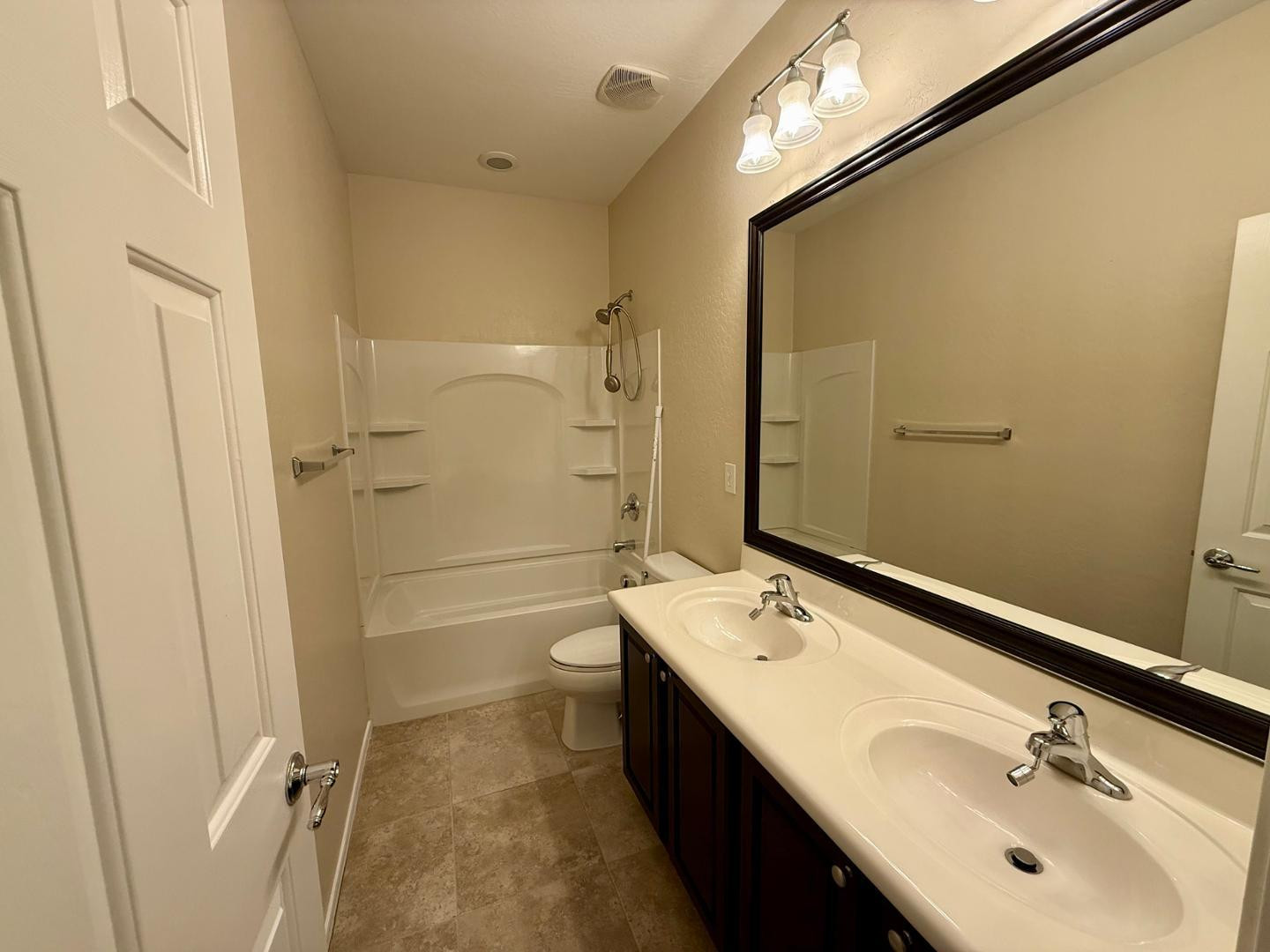 1929 West Black Hill Road Phoenix, AZ 85085 - Photo 18 of 26 a bathroom with a sink a toilet and shower