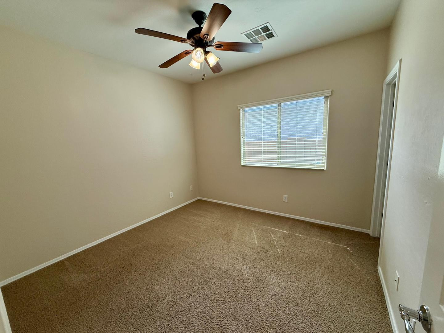 1929 West Black Hill Road Phoenix, AZ 85085 - Photo 20 of 26 an empty room with a window