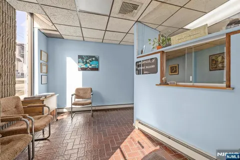 a view of a chairs in wooden floor