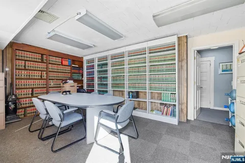 a view of a buildings with a street