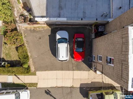a view of a car park in front of a building