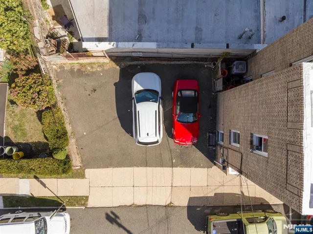 a view of a car park in front of a building