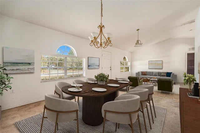 a view of a hallway with a chandelier
