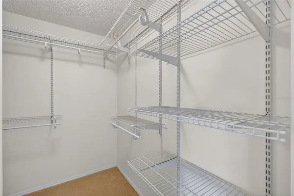 a view of a room with racks on the wall