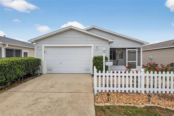 front view of a house with a small yard