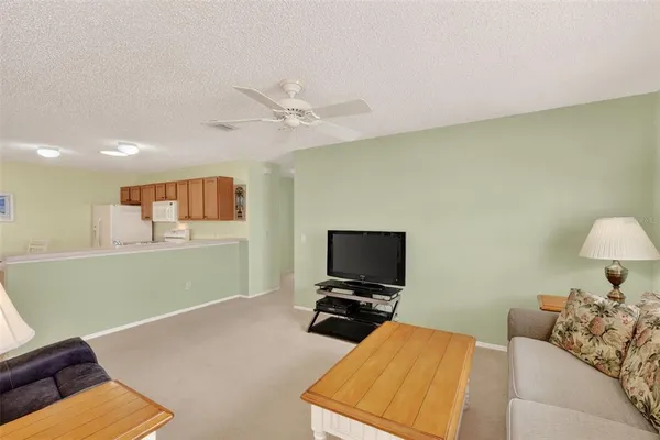 a room with furniture and a flat screen tv