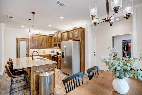 a kitchen with refrigerator and countertop