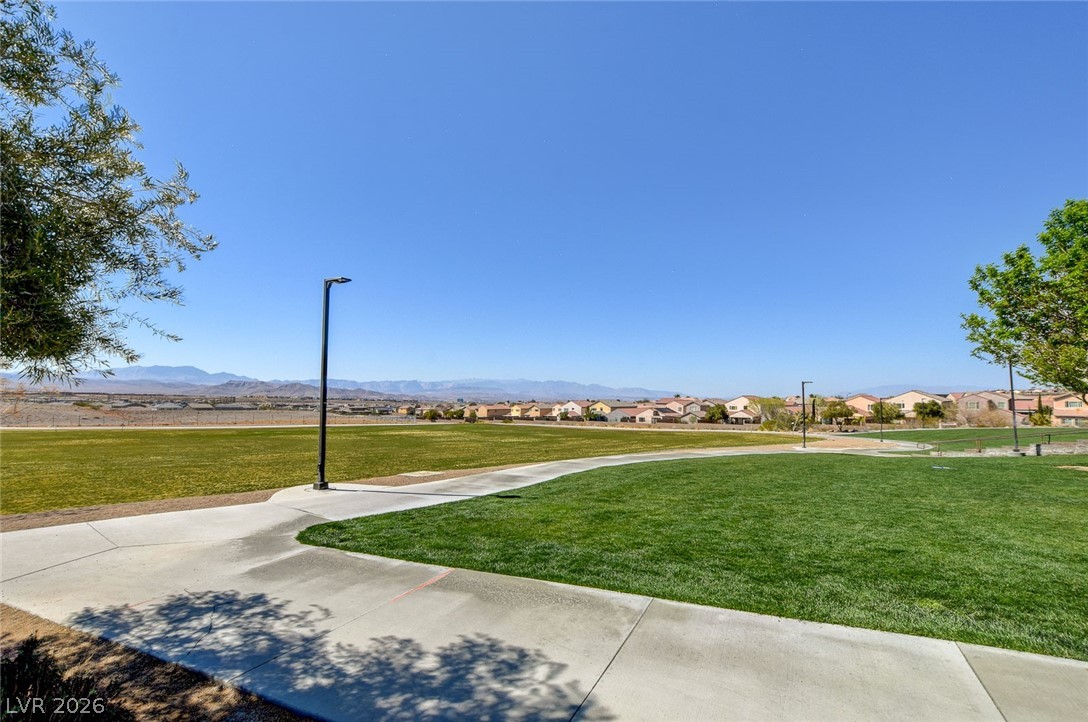 2793 Rosenhearty Drive Henderson, NV 89044 - Photo 81 of 85 Green recreational spaces offer mountain views and neighborhood connectivity.