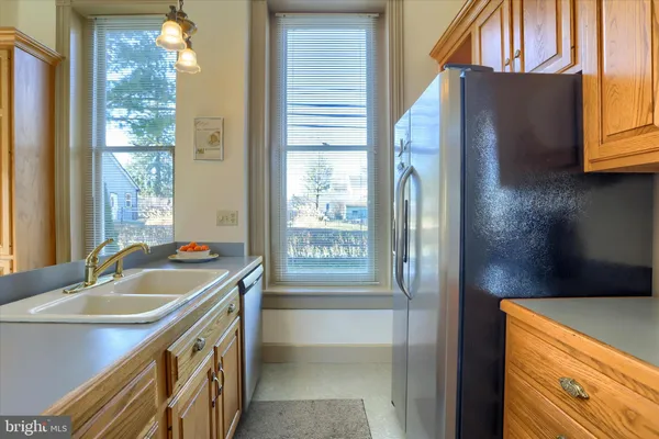 a large kitchen with cabinets