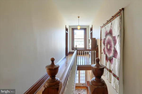 a view of front door with wooden floor