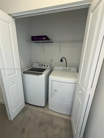 a bathroom with a toilet and a bathtub