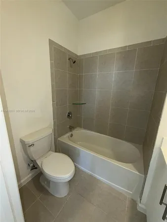 a bathroom with a sink and a bathtub