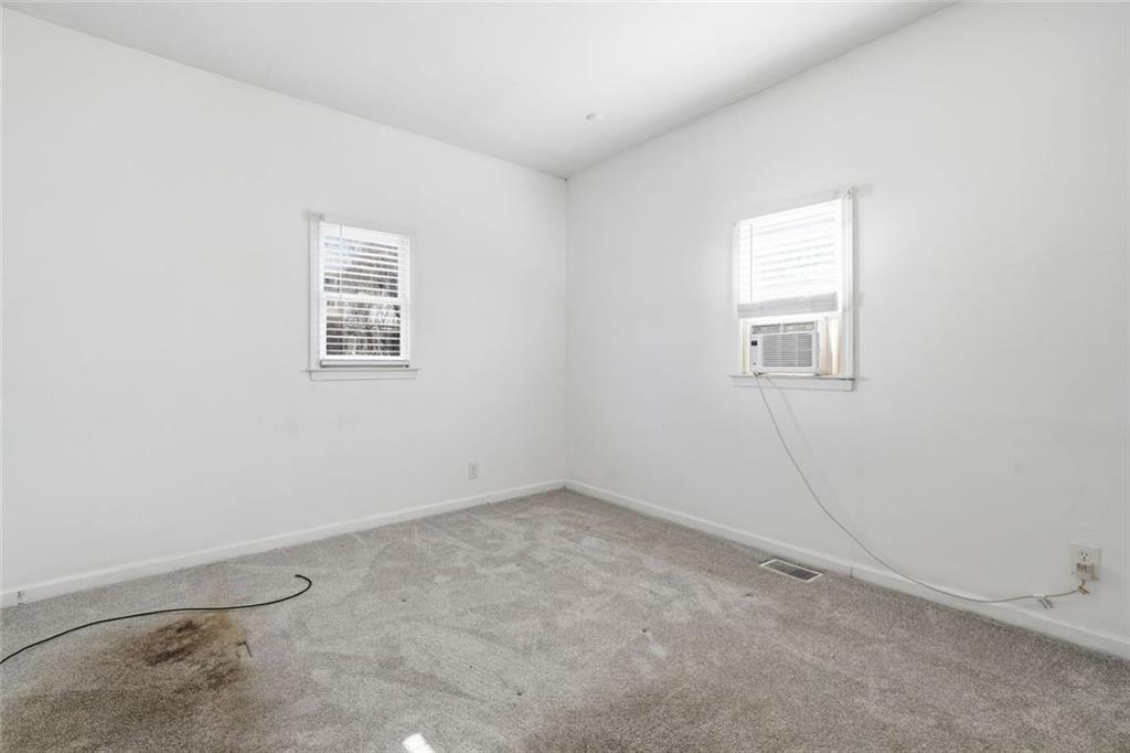 174 Cherokee Avenue Nelson, GA 30151 - Photo 23 of 28 an empty room with windows