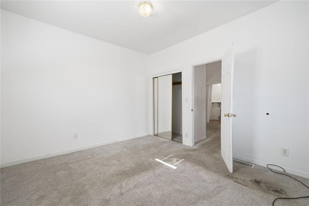 174 Cherokee Avenue Nelson, GA 30151 - Photo 24 of 28 an empty room with closet area