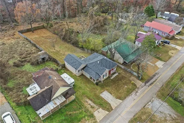 an aerial view of residential house with outdoor space